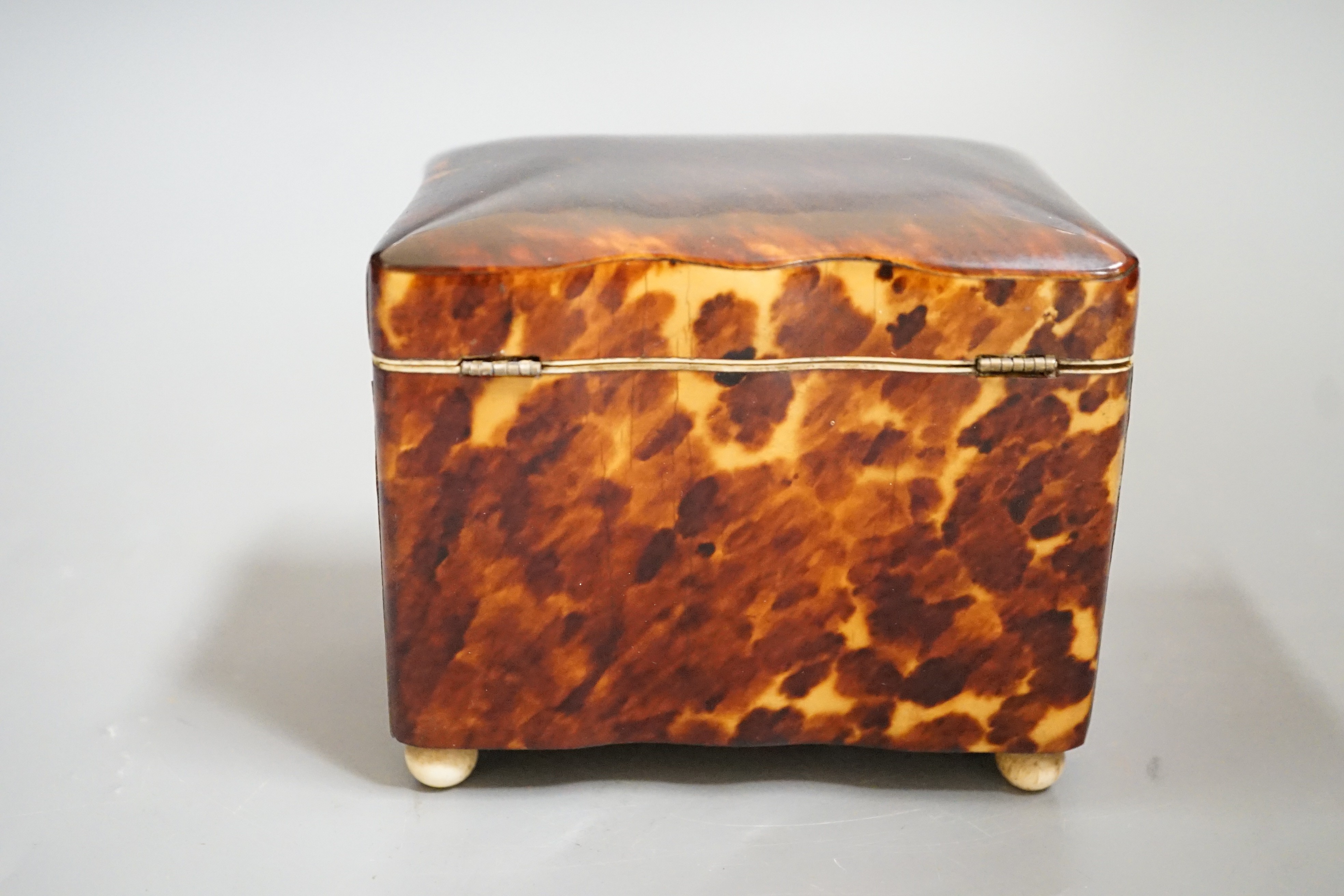 A rare small 19th century tortoiseshell and ivory mounted tea caddy, 9cms wide x 10cms high